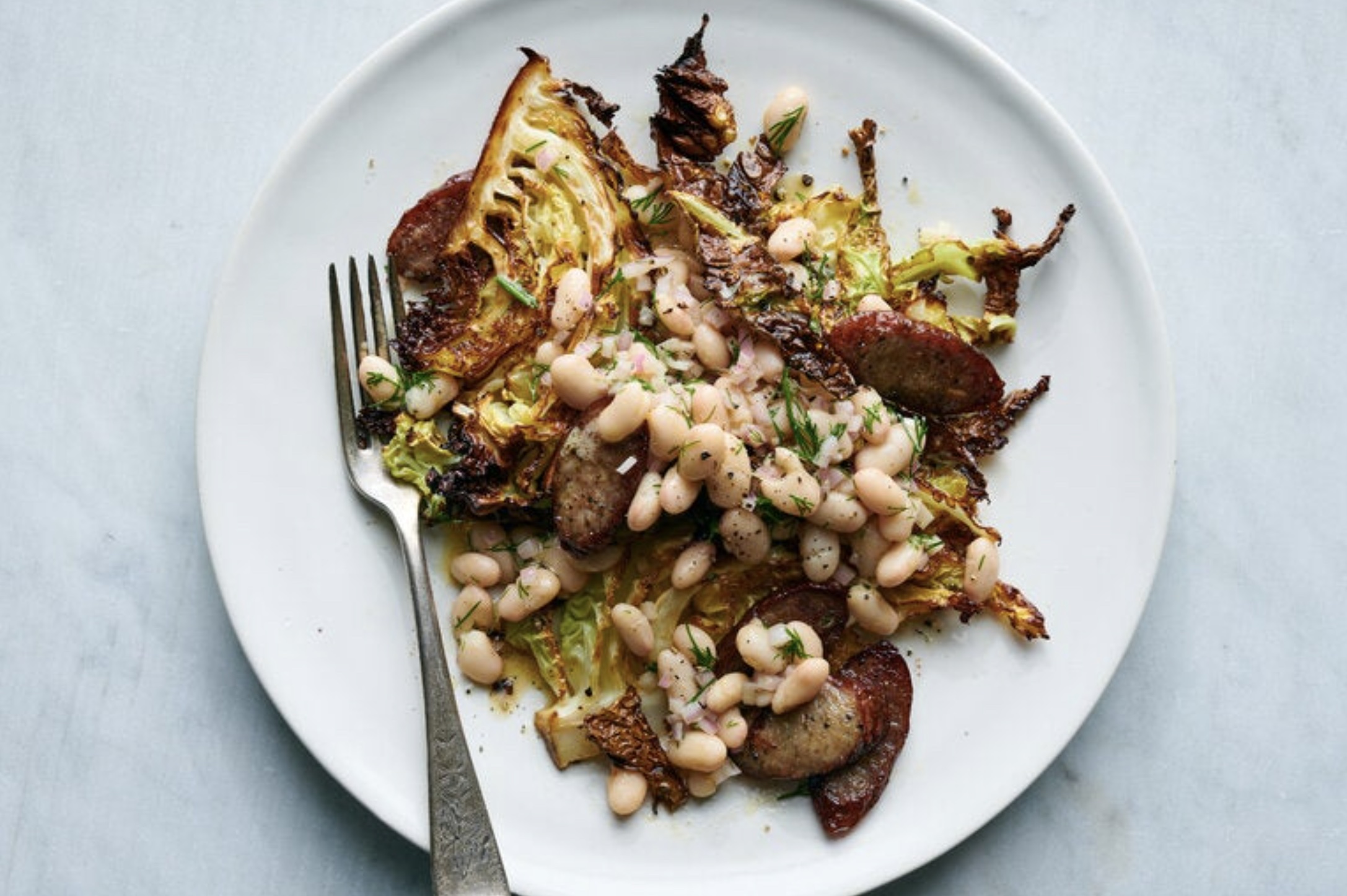 Sheet-Pan Kielbasa With Cabbage and Beans